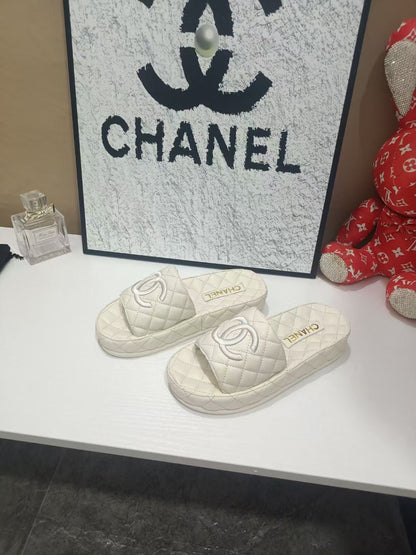 Chanel 26s Quilted Slide Sandals In White Calfskin