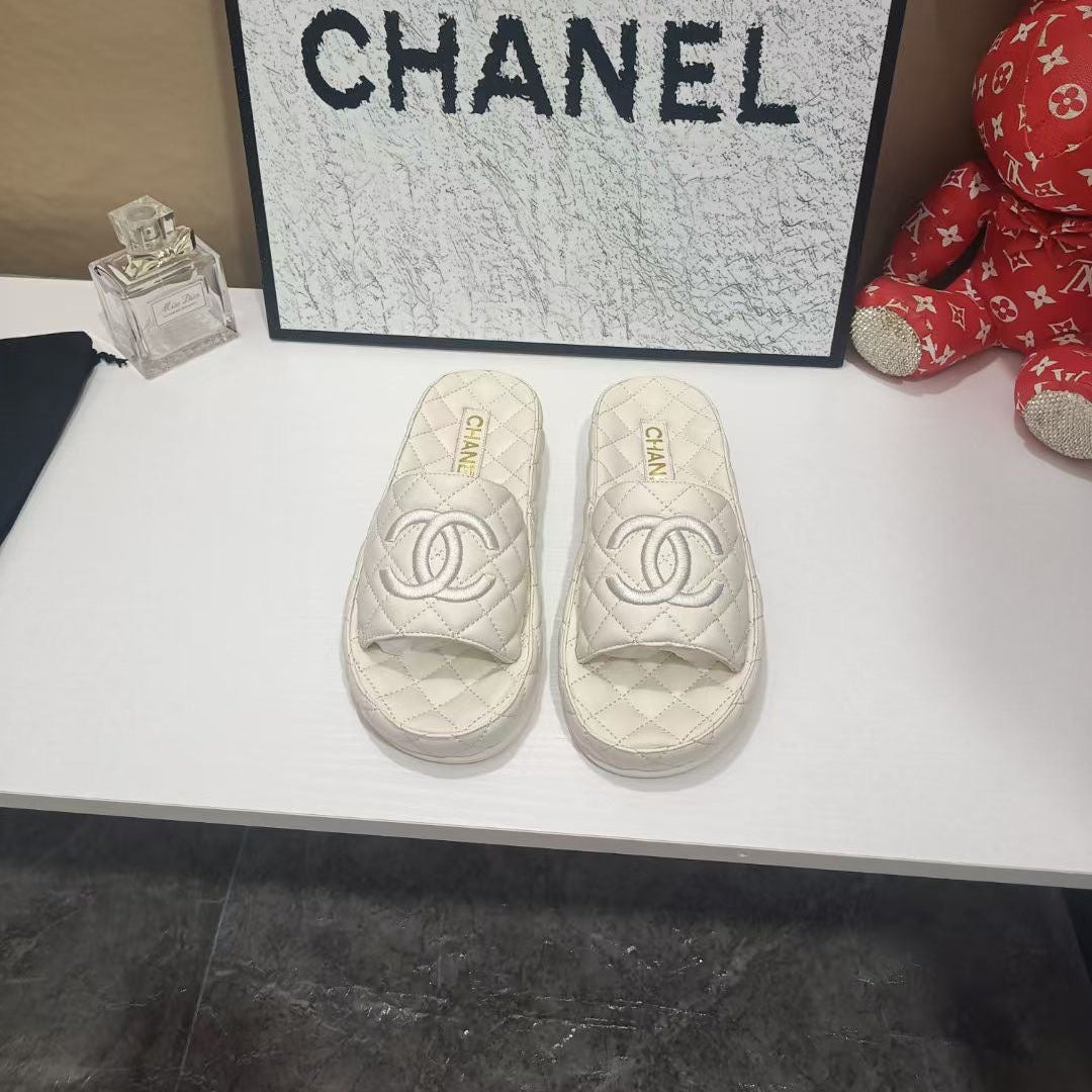 Chanel 26s Quilted Slide Sandals In White Calfskin